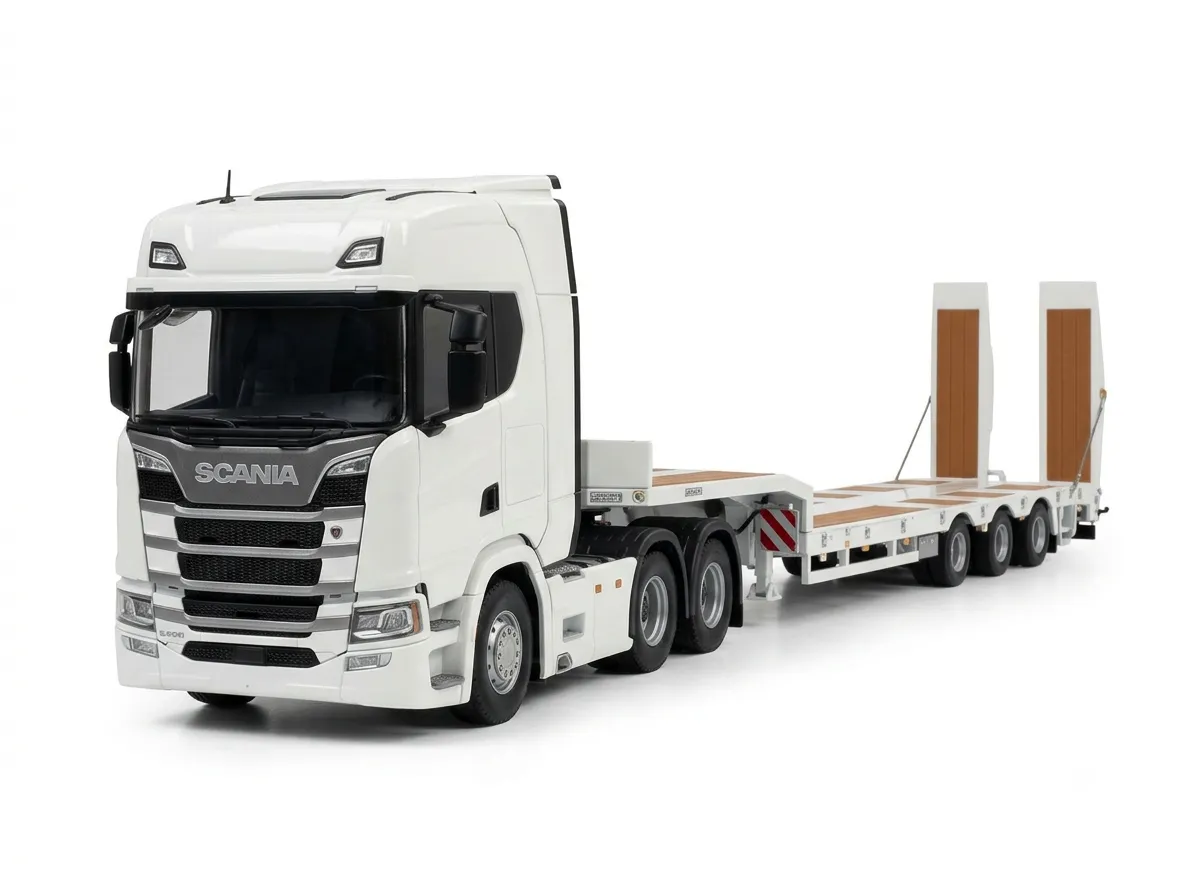 Arriendo de Camión Cama Baja Scania _ Transporte Pesado - Servisan Servicio de arriendo de camión cama baja Scania para traslado seguro de maquinaria pesada y cargas sobredimensionadas. Cotice con Servisan.